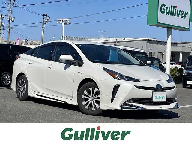 トヨタ プリウス A 青森県 2019(平31)年 8.9万km ホワイトパールクリスタルシャイン ワンオーナー/純正ナビ/BT/DVD/CD//純正アルミホイール/純正フロアマットクルーズコントロール/プッシュスタート/ETC2.0/バックカメラ/アイドリングストップ/クルーズコントロール/モデリスタエアロ/レーンアシスタント/コーナーセンサー/パワーシートD席/オートマチックハイビーム
