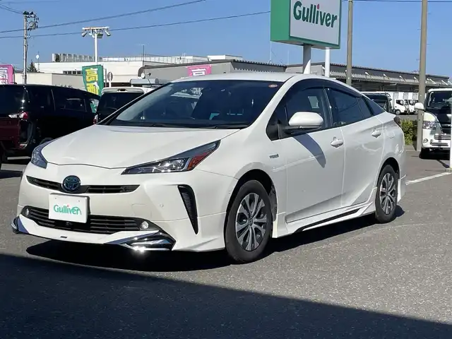 トヨタ プリウス A 青森県 2019(平31)年 8.9万km ホワイトパールクリスタルシャイン ワンオーナー/純正ナビ/BT/DVD/CD//純正アルミホイール/純正フロアマットクルーズコントロール/プッシュスタート/ETC2.0/バックカメラ/アイドリングストップ/クルーズコントロール/モデリスタエアロ/レーンアシスタント/コーナーセンサー/パワーシートD席/オートマチックハイビーム