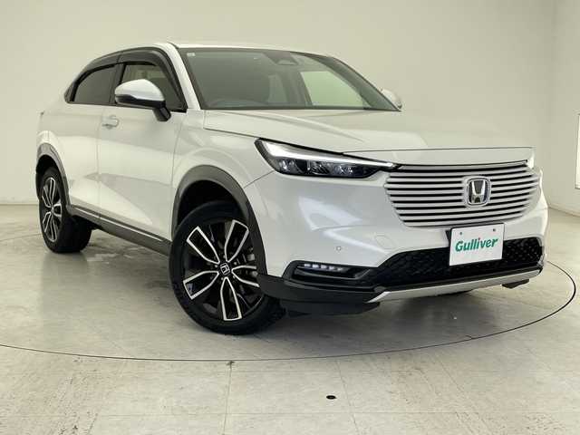 ホンダ ヴェゼル ハイブリッド e:HEV Z 千葉県 2021(令3)年 2.9万km プラチナホワイトパール ホンダコネクトナビ/　Bluetooth/フルセグTV/　Apple car play/Android Auto/ホンダセンシング/レーダークルーズコントロール/レーンキープアシスト/衝突軽減ブレーキ/クリアランスソナー/ブラインドスポットモニター/先行車発進警報/標識認識機能/ダウンヒルアシスト/電動パーキング/オートホールド/オートハイビーム/ハーフレザーシート/前席シートヒーター/ステアリングヒーター/ワイヤレス充電/パワーバックドア/ビルトインETC2.0/前後ドラレコ/LEDライト/フォグランプ/パドルシフト/フロアマット/ドアバイザー/トノカバー
