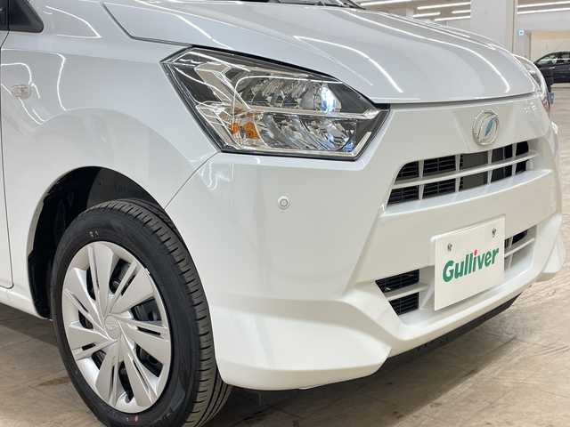 ダイハツ ミラ イース X SAⅢ 道央・札幌 2025(令7)年 0.1万km シャイニングホワイトパール /オーディオレス//バックカメラ取付有//４WD//スマートアシスト車//衝突軽減ブレーキ//オートライト//オートハイビーム//コーナーセンサー//横滑り防止装置//アイドリングストップ//パワーウィンドウ