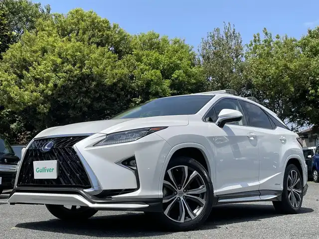 レクサス ＲＸ 450h 東京都 2016(平28)年 2.9万km ソニッククォーツ ワンオーナー/TRDエアロ/・フロントスポイラー/サイドスカート/・スポーツマフラー＆リヤディフューザー/本革シート/前席シートヒーター/ベンチレーション/ムーンルーフ/三眼LEDヘッドランプ/ルーフレール/純正12.3インチナビ/・プレミアムサウンドシステム（12スピーカ）/・フルセグTV/Bluetoothオーディオ/DVD/後席モニター×2（TVM-PW900）/ヘッドアップディスプレイ/ステアリングヒーター/純正アルミホイール20インチ/ビルトインETC2.0/純正フロアマット/保証書/取扱説明書/スペアキー+カードキー