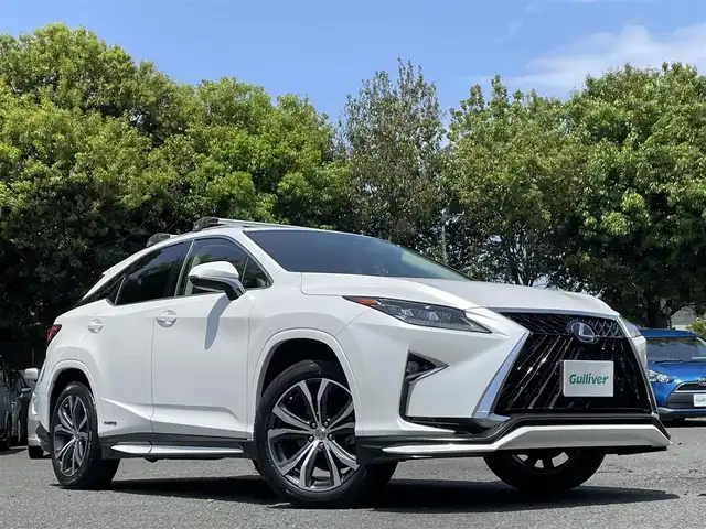 レクサス ＲＸ 450h 東京都 2016(平28)年 2.9万km ソニッククォーツ ワンオーナー/TRDエアロ/・フロントスポイラー/サイドスカート/・スポーツマフラー＆リヤディフューザー/本革シート/前席シートヒーター/ベンチレーション/ムーンルーフ/三眼LEDヘッドランプ/ルーフレール/純正12.3インチナビ/・プレミアムサウンドシステム（12スピーカ）/・フルセグTV/Bluetoothオーディオ/DVD/後席モニター×2（TVM-PW900）/ヘッドアップディスプレイ/ステアリングヒーター/純正アルミホイール20インチ/ビルトインETC2.0/純正フロアマット/保証書/取扱説明書/スペアキー+カードキー