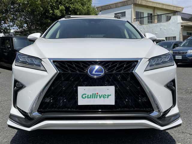 レクサス ＲＸ 450h 東京都 2016(平28)年 2.9万km ソニッククォーツ ワンオーナー/TRDエアロ/・フロントスポイラー/サイドスカート/・スポーツマフラー＆リヤディフューザー/本革シート/前席シートヒーター/ベンチレーション/ムーンルーフ/三眼LEDヘッドランプ/ルーフレール/純正12.3インチナビ/・プレミアムサウンドシステム（12スピーカ）/・フルセグTV/Bluetoothオーディオ/DVD/後席モニター×2（TVM-PW900）/ヘッドアップディスプレイ/ステアリングヒーター/純正アルミホイール20インチ/ビルトインETC2.0/純正フロアマット/保証書/取扱説明書/スペアキー+カードキー