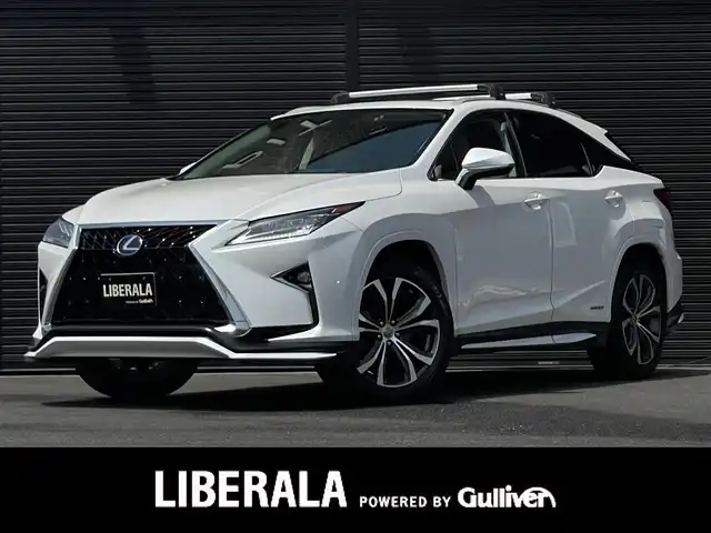 レクサス ＲＸ 450h 山梨県 2016(平28)年 2.9万km ソニッククォーツ ワンオーナー/TRDエアロ/・フロントスポイラー/サイドスカート/・スポーツマフラー＆リヤディフューザー/本革シート/前席シートヒーター/ベンチレーション/ムーンルーフ/三眼LEDヘッドランプ/ルーフレール/純正12.3インチナビ/・プレミアムサウンドシステム（12スピーカ）/・フルセグTV/Bluetoothオーディオ/DVD/後席モニター×2（TVM-PW900）/ヘッドアップディスプレイ/ステアリングヒーター/純正アルミホイール20インチ/ビルトインETC2.0/純正フロアマット/保証書/取扱説明書/スペアキー+カードキー