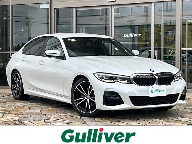 ＢＭＷ ３２０ｉ Mスポーツ 静岡県 2019(令1)年 1.5万km ミネラルホワイト 純正メーカーナビ/・FM/AM/・Bluetooth/・Screen Mirroring/主要装備/・ＥＴＣ/・ＯＰ１９インチＡＷ/・黒革シート/・パワーバックドア/・前後純正ドラレコ/・運転席＋助手席パワーシート/・運転席+助手席シートヒーター/・サイドカーテンエアバッグ/・走行モード切替/・前後コーナーセンサー/・レーダークルコン/・ワイヤレス充電/・オートハイビーム/・リアオートエアコン/・パーキングアシスト
