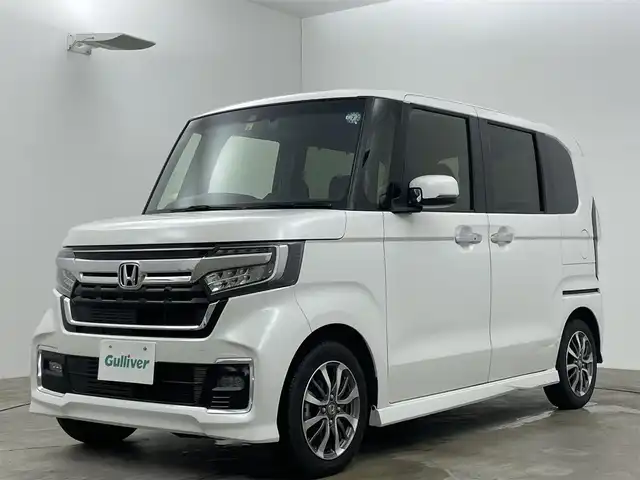 ホンダ Ｎ ＢＯＸ カスタム L 岡山県 2022(令4)年 3.5万km プラチナホワイトパール ディスプレイオーディオ	/【ワンセグ/Bluetooth/USB】	/バックカメラ	/追従型クルーズコントロール	/オートハイビーム	/LEDヘッドライト（AUTO機能付き）	/ビルトインETC	/前席シートヒーター		/衝突軽減ブレーキシステム	/車線逸脱防止システム	/横滑り防止装置/踏み間違い防止装置	/純正ドライブレコーダー（前後）	/純正14インチアルミ	/コーナーセンサー（後）	/純正フロアマット	/ステアリングスイッチ	/ISOFIX/後席サンシェイド/チルトステアリング/シートリフター/シートバックテーブル/ウィンカーミラー	/プッシュスタート	/スマートキー×2	/保証書	/取扱説明書