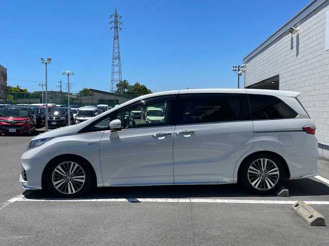 ホンダ オデッセイ ハイブリッド アブソルート ホンダセンシング 静岡県 2019(平31)年 6.9万km プラチナホワイトパール 純正ナビ/地デジTV/純正CD/DVD/Bluetooth/バック/全方位カメラ/フリップダウンリアモニター/両側パワースライドドア/ホンダセンシング/レーダークルーズコントロール/純正17インチAW/2.0ETC/スマートキー/スペアキー