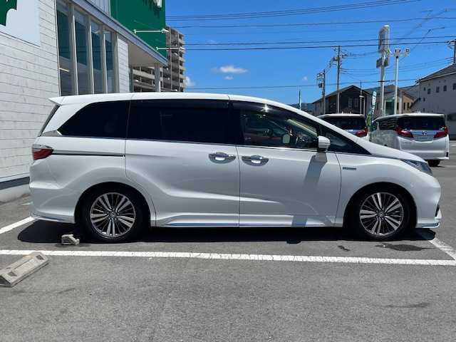ホンダ オデッセイ ハイブリッド アブソルート ホンダセンシング 静岡県 2019(平31)年 6.9万km プラチナホワイトパール 純正ナビ/地デジTV/純正CD/DVD/Bluetooth/バック/全方位カメラ/フリップダウンリアモニター/両側パワースライドドア/ホンダセンシング/レーダークルーズコントロール/純正17インチAW/2.0ETC/スマートキー/スペアキー