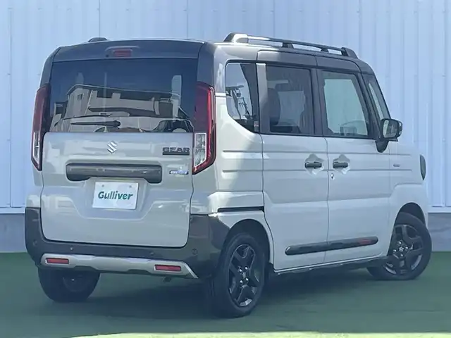 スズキ スペーシア ギア HYBRID XZ 香川県 2024(令6)年 0.3万km 黄Ⅱ ヘッドアップディスプレイ/両側パワースライドドア/シートヒーター/ステアリングヒーター/スズキセーフティサポート/→デュアルカメラブレーキサポート（衝突軽減）/→車線逸脱抑制機能/→アダプティブクルーズコントロール/→誤発進抑制機能/→標識認識機能/ルーフレール/ステアリングヒーター/ステアリングリモコン/LEDオートライト/LEDフォグランプ/電動格納ミラー（ウィンカー付）/12V電源/後席サンシェード/後席オットマン/スマートキー