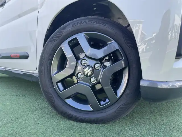 スズキ スペーシア ギア HYBRID XZ 香川県 2024(令6)年 0.3万km 黄Ⅱ ヘッドアップディスプレイ/両側パワースライドドア/シートヒーター/ステアリングヒーター/スズキセーフティサポート/→デュアルカメラブレーキサポート（衝突軽減）/→車線逸脱抑制機能/→アダプティブクルーズコントロール/→誤発進抑制機能/→標識認識機能/ルーフレール/ステアリングヒーター/ステアリングリモコン/LEDオートライト/LEDフォグランプ/電動格納ミラー（ウィンカー付）/12V電源/後席サンシェード/後席オットマン/スマートキー