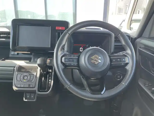 スズキ スペーシア ギア HYBRID XZ 香川県 2024(令6)年 0.3万km 黄Ⅱ ヘッドアップディスプレイ/両側パワースライドドア/シートヒーター/ステアリングヒーター/スズキセーフティサポート/→デュアルカメラブレーキサポート（衝突軽減）/→車線逸脱抑制機能/→アダプティブクルーズコントロール/→誤発進抑制機能/→標識認識機能/ルーフレール/ステアリングヒーター/ステアリングリモコン/LEDオートライト/LEDフォグランプ/電動格納ミラー（ウィンカー付）/12V電源/後席サンシェード/後席オットマン/スマートキー