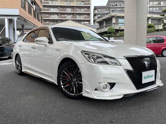 トヨタ クラウン ハイブリッド アスリートG 大阪府 2013(平25)年 12万km ホワイトパールクリスタルシャイン 純正ナビ/バックカメラ/サイドカメラ/サンルーフ/TRDアンダーエアロ/フルセグテレビ/パワーシート/電動リアゲート/レーダークルーズコントロール/フロントエアーシート/フロントシートヒーター/社外マフラー/純正アルミホイール/プッシュスタート/純正フロアマット/カーテンエアバッグ/ETC/スペアキー