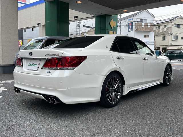 トヨタ クラウン ハイブリッド アスリートG 大阪府 2013(平25)年 12万km ホワイトパールクリスタルシャイン 純正ナビ/バックカメラ/サイドカメラ/サンルーフ/TRDアンダーエアロ/フルセグテレビ/パワーシート/電動リアゲート/レーダークルーズコントロール/フロントエアーシート/フロントシートヒーター/社外マフラー/純正アルミホイール/プッシュスタート/純正フロアマット/カーテンエアバッグ/ETC/スペアキー