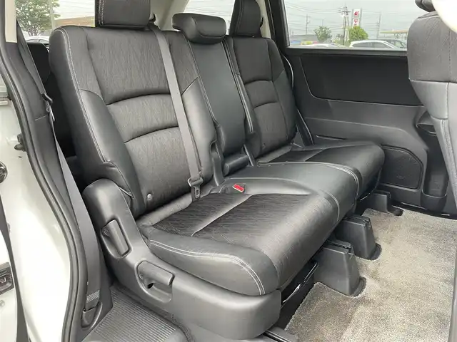 ホンダ オデッセイ アブソルート 鳥取県 2014(平26)年 6.7万km ホワイトオーキッドパール 純正ナビ／ＴＶ／ＤＶＤ／ＣＤ／ＢＴ/バックカメラ・ビルトインＥＴＣ/衝突軽減ブレーキ（CTBA）/クルーズコントロール/両側パワースライド/ＴＥＩＮ車高調/ＲＡＹＳ１９インチアルミ/社外レーダー探知機/社外フロントグリル/ＬＥＤヘットライト/ハーフレザーシート/純正アルミスタットレスセット積/（タイヤ残溝　７分山）/プッシュエンジンスタート/アイドリングストップ/スペアキーｘ１
