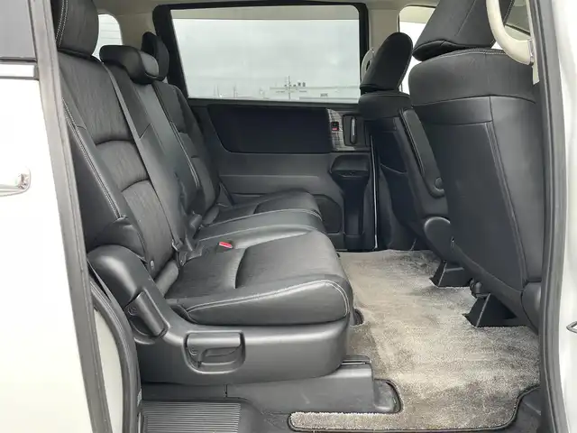 ホンダ オデッセイ アブソルート 鳥取県 2014(平26)年 6.7万km ホワイトオーキッドパール 純正ナビ／ＴＶ／ＤＶＤ／ＣＤ／ＢＴ/バックカメラ・ビルトインＥＴＣ/衝突軽減ブレーキ（CTBA）/クルーズコントロール/両側パワースライド/ＴＥＩＮ車高調/ＲＡＹＳ１９インチアルミ/社外レーダー探知機/社外フロントグリル/ＬＥＤヘットライト/ハーフレザーシート/純正アルミスタットレスセット積/（タイヤ残溝　７分山）/プッシュエンジンスタート/アイドリングストップ/スペアキーｘ１