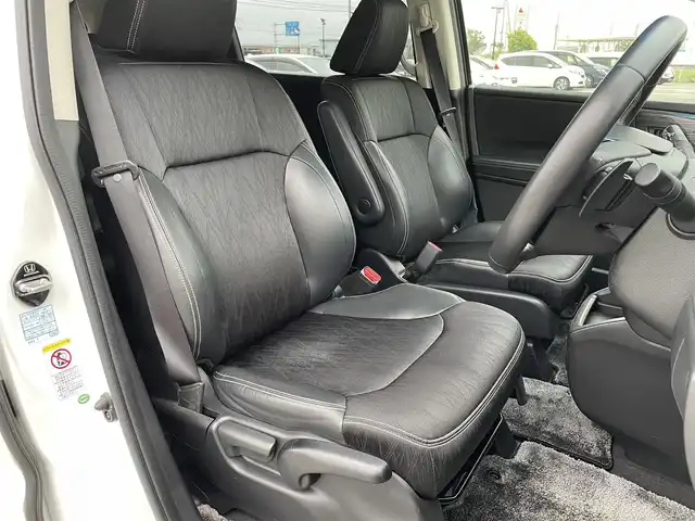 ホンダ オデッセイ アブソルート 鳥取県 2014(平26)年 6.7万km ホワイトオーキッドパール 純正ナビ／ＴＶ／ＤＶＤ／ＣＤ／ＢＴ/バックカメラ・ビルトインＥＴＣ/衝突軽減ブレーキ（CTBA）/クルーズコントロール/両側パワースライド/ＴＥＩＮ車高調/ＲＡＹＳ１９インチアルミ/社外レーダー探知機/社外フロントグリル/ＬＥＤヘットライト/ハーフレザーシート/純正アルミスタットレスセット積/（タイヤ残溝　７分山）/プッシュエンジンスタート/アイドリングストップ/スペアキーｘ１