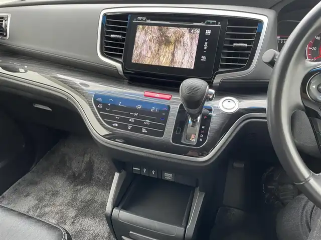ホンダ オデッセイ アブソルート 鳥取県 2014(平26)年 6.7万km ホワイトオーキッドパール 純正ナビ／ＴＶ／ＤＶＤ／ＣＤ／ＢＴ/バックカメラ・ビルトインＥＴＣ/衝突軽減ブレーキ（CTBA）/クルーズコントロール/両側パワースライド/ＴＥＩＮ車高調/ＲＡＹＳ１９インチアルミ/社外レーダー探知機/社外フロントグリル/ＬＥＤヘットライト/ハーフレザーシート/純正アルミスタットレスセット積/（タイヤ残溝　７分山）/プッシュエンジンスタート/アイドリングストップ/スペアキーｘ１