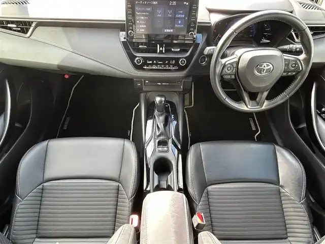 トヨタ カローラツーリング ダブルバイビー 愛媛県 2020(令2)年 4.9万km ブラックマイカ 純正9型ディスプレイオーディオ/バックカメラ/前後ドライブレコーダー/トヨタセーフティセンス/衝突被害軽減装置/車線逸脱防止装置/レーダークルーズコントロール/ブラインドスポットモニター/クリアランスソナー/ステアリングリモコン/ハーフレザー/ETC/電動パーキングブレーキ/電格ミラー/ヒートミラー/ヘッドライトレベライザー/トノカバー/純正布生地ラゲッジマット/LEDヘッドライト/現状サマー(純正AW)(215/45/R17)/TOYO TRANPATH mpZ