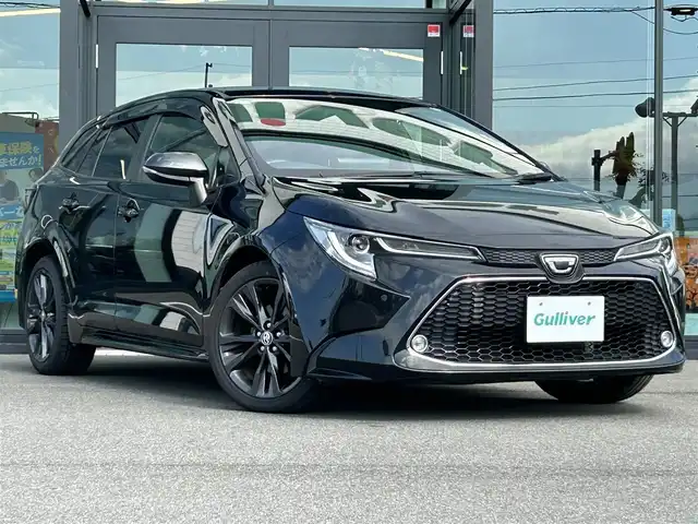 トヨタ カローラツーリング ダブルバイビー 愛媛県 2020(令2)年 4.9万km ブラックマイカ 純正9型ディスプレイオーディオ/バックカメラ/前後ドライブレコーダー/トヨタセーフティセンス/衝突被害軽減装置/車線逸脱防止装置/レーダークルーズコントロール/ブラインドスポットモニター/クリアランスソナー/ステアリングリモコン/ハーフレザー/ETC/電動パーキングブレーキ/電格ミラー/ヒートミラー/ヘッドライトレベライザー/トノカバー/純正布生地ラゲッジマット/LEDヘッドライト/現状サマー(純正AW)(215/45/R17)/TOYO TRANPATH mpZ