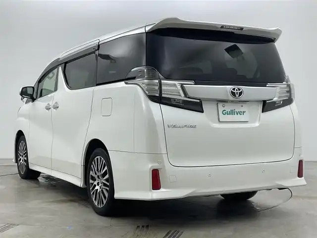 トヨタ ヴェルファイア Z Gエディション 岡山県 2015(平27)年 6.7万km ホワイトパールクリスタルシャイン ALPINE10インチナビ/・FM/AM/Bluetooth/フルセグ/CD/DVD/ALPINE12.8インチフリップダウンモニター/ALPINEサウンドシステム/ハーフレザーシート/・パワーシート/・シートメモリー/パワーバックドア/ETC/トヨタセーフティーセンス/・プリクラッシュセーフティ/・レーンキープアシスト/・レーダークルーズコントロール/・コーナーセンサー/電動パーキング/両側パワースライドドア/LEDヘッドライト/ドアバイザー/新車保証書/取扱説明書