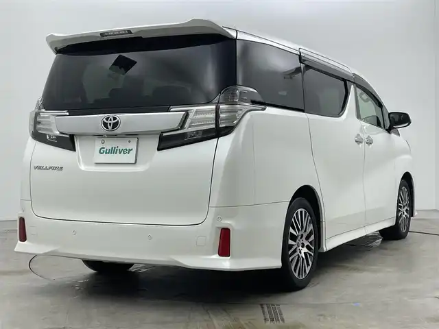 トヨタ ヴェルファイア Z Gエディション 岡山県 2015(平27)年 6.7万km ホワイトパールクリスタルシャイン ALPINE10インチナビ/・FM/AM/Bluetooth/フルセグ/CD/DVD/ALPINE12.8インチフリップダウンモニター/ALPINEサウンドシステム/ハーフレザーシート/・パワーシート/・シートメモリー/パワーバックドア/ETC/トヨタセーフティーセンス/・プリクラッシュセーフティ/・レーンキープアシスト/・レーダークルーズコントロール/・コーナーセンサー/電動パーキング/両側パワースライドドア/LEDヘッドライト/ドアバイザー/新車保証書/取扱説明書