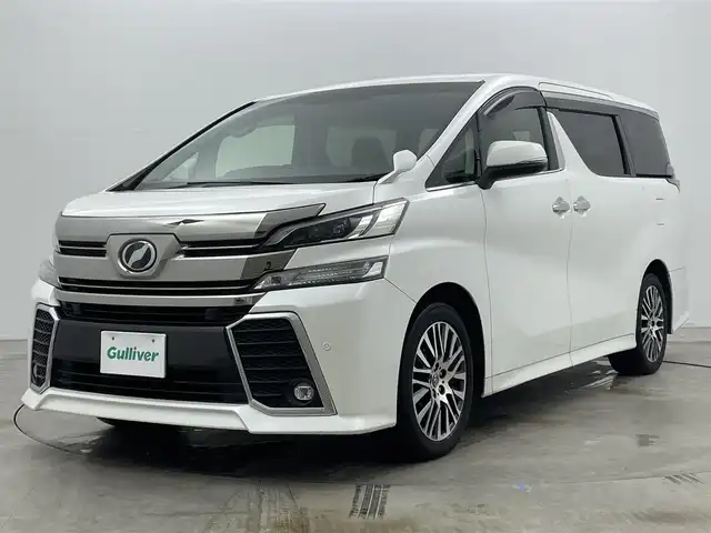 トヨタ ヴェルファイア Z Gエディション 岡山県 2015(平27)年 6.7万km ホワイトパールクリスタルシャイン ALPINE10インチナビ/・FM/AM/Bluetooth/フルセグ/CD/DVD/ALPINE12.8インチフリップダウンモニター/ALPINEサウンドシステム/ハーフレザーシート/・パワーシート/・シートメモリー/パワーバックドア/ETC/トヨタセーフティーセンス/・プリクラッシュセーフティ/・レーンキープアシスト/・レーダークルーズコントロール/・コーナーセンサー/電動パーキング/両側パワースライドドア/LEDヘッドライト/ドアバイザー/新車保証書/取扱説明書