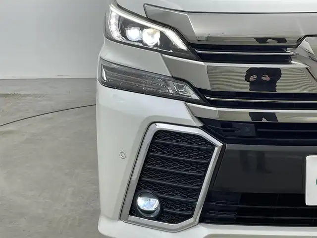 トヨタ ヴェルファイア Z Gエディション 岡山県 2015(平27)年 6.7万km ホワイトパールクリスタルシャイン ALPINE10インチナビ/・FM/AM/Bluetooth/フルセグ/CD/DVD/ALPINE12.8インチフリップダウンモニター/ALPINEサウンドシステム/ハーフレザーシート/・パワーシート/・シートメモリー/パワーバックドア/ETC/トヨタセーフティーセンス/・プリクラッシュセーフティ/・レーンキープアシスト/・レーダークルーズコントロール/・コーナーセンサー/電動パーキング/両側パワースライドドア/LEDヘッドライト/ドアバイザー/新車保証書/取扱説明書