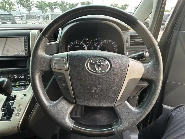 トヨタ ヴェルファイア 2．4Z プラチナセレⅡ ゴールド 和歌山県 2010(平22)年 13.4万km ブラック 純正7インチナビ/バックカメラ/ビルトインETC/前方ドライブレコーダー/両側パワースライド/前後コーナーセンサー/オットマン/オートライト/ツイーター（パイオニア）/電動リアゲート/フルオートパワーウィンドウ/ステアリングリモコン/オートワイパー/ドアバイザー/HIDヘッドライト/プッシュスタート
