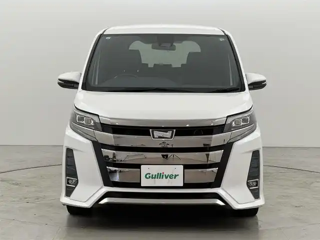 トヨタ ノア Si ダブルバイビー 福岡県 2018(平30)年 7.5万km ホワイトパールクリスタルシャイン ワンオーナー　/純正９型ナビ（フルセグＴＶ）　/バックカメラ　/ビルトインＥＴＣ　/クルーズコントロール　/衝突軽減ブレーキ　/レーンキープ　/先行車発進　/オートマチックハイビーム　/ＭＴモード付き　/両側電動スライドドア　/ハーフレザー　/ＬＥＤヘッドライト　/純正１６インチアルミホイール