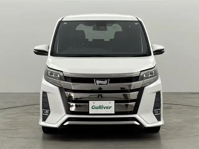 トヨタ ノア Si ダブルバイビー 福岡県 2018(平30)年 7.5万km ホワイトパールクリスタルシャイン ワンオーナー　/純正９型ナビ（フルセグＴＶ）　/バックカメラ　/ビルトインＥＴＣ　/クルーズコントロール　/衝突軽減ブレーキ　/レーンキープ　/先行車発進　/オートマチックハイビーム　/ＭＴモード付き　/両側電動スライドドア　/ハーフレザー　/ＬＥＤヘッドライト　/純正１６インチアルミホイール