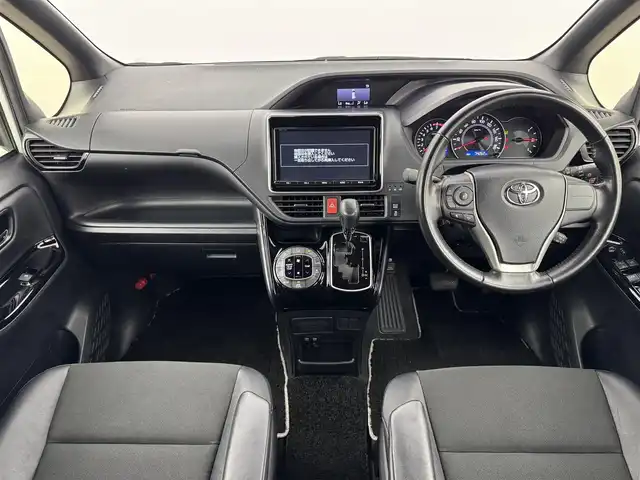 トヨタ ノア Si ダブルバイビー 福岡県 2018(平30)年 7.5万km ホワイトパールクリスタルシャイン ワンオーナー　/純正９型ナビ（フルセグＴＶ）　/バックカメラ　/ビルトインＥＴＣ　/クルーズコントロール　/衝突軽減ブレーキ　/レーンキープ　/先行車発進　/オートマチックハイビーム　/ＭＴモード付き　/両側電動スライドドア　/ハーフレザー　/ＬＥＤヘッドライト　/純正１６インチアルミホイール
