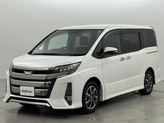 トヨタ ノア Si ダブルバイビー 福岡県 2018(平30)年 7.5万km ホワイトパールクリスタルシャイン ワンオーナー　/純正９型ナビ（フルセグＴＶ）　/バックカメラ　/ビルトインＥＴＣ　/クルーズコントロール　/衝突軽減ブレーキ　/レーンキープ　/先行車発進　/オートマチックハイビーム　/ＭＴモード付き　/両側電動スライドドア　/ハーフレザー　/ＬＥＤヘッドライト　/純正１６インチアルミホイール
