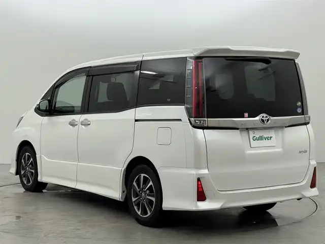トヨタ ノア Si ダブルバイビー 福岡県 2018(平30)年 7.5万km ホワイトパールクリスタルシャイン ワンオーナー　/純正９型ナビ（フルセグＴＶ）　/バックカメラ　/ビルトインＥＴＣ　/クルーズコントロール　/衝突軽減ブレーキ　/レーンキープ　/先行車発進　/オートマチックハイビーム　/ＭＴモード付き　/両側電動スライドドア　/ハーフレザー　/ＬＥＤヘッドライト　/純正１６インチアルミホイール