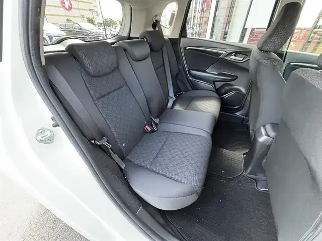 ホンダ フィット 13G Lパッケージ 宮城県 2013(平25)年 10.9万km プレミアムホワイトパール 登録時走行距離108880km/FM・AM・ワンセグTV・CD・DVD・社外ナビ/スペアキーあり/ETC/スマートキー/スターター/アイドリングストップ/プッシュスタート/ウインカーミラー/電動格納ミラー/ドアバイザー/純正フロアマット/社外アルミホイール/カーテンエアバッグ/ECONモード