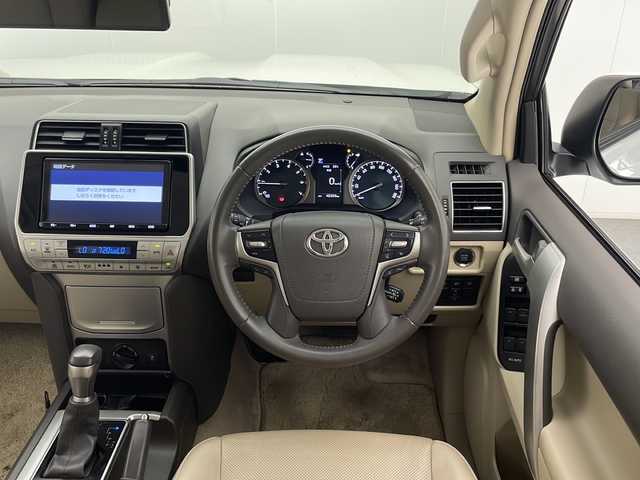 トヨタ ランドクルーザー プラド TX Lパッケージ 宮崎県 2019(平31)年 4.9万km ホワイトパールクリスタルシャイン Toyota Safety Sense/〇プリクラシュセーフティ/〇レーンディパーチャーアラート/〇オートマチックハイビーム/〇クリアランスソナー/純正9インチSDナビ/フルセグTV/CD/DVD/Bluetooth/バックカメラ/ベージュレザーシート/パワーシート/シートヒーター/シートベンチレーション/社外17インチAW/LEDヘッドライト/ビルトインETC/保証書/取扱説明書