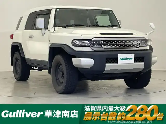トヨタ ＦＪクルーザー 滋賀県 2011(平23)年 14.4万km ホワイト 社外9インチナビ/【Bluetooth/CD/DVD/フルセグTV/USB】/バックカメラ/リアソナー/リアデフロック/社外LEDヘッドライト/トランスファー【L4/H2/H4】/ETC/電動格納ミラー