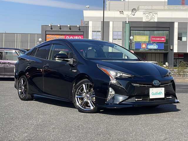 トヨタ プリウス S ツーリングセレクション 千葉県 2016(平28)年 11.1万km アティチュードブラックマイカ 社外エアロ/純正9インチナビ【DSZT-YC4T】/フルセグTV/Bluetooth/CD/DVD/FM/AM/SD/バックカメラ/ビルトインETC/レーダークルーズコントロール/プリクラッシュセーフティー/レーンキープアシスト/クリアランスソナー/シートヒーターD/N席/LEDヘッドライト/オートライト/オートハイビーム/ステアリングスイッチ/ドアバイザー/社外アルミ17インチ/純正フロアマット/スマートキー/保証書/取扱説明書