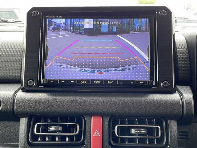 スズキ ジムニー シエラ JC 長野県 2019(令1)年 7万km ブルーイッシュブラックパール3 4WD/パナソニックSDナビ（CN-RZ846）/FM・AM・DVD・CD・フルセグTV/Bluetooth Audio/バックカメラ/純正15インチアルミホイール/クルーズコントロール/衝突軽減ブレーキ/前席シートヒーター/ドライブレコーダー/車線逸脱警報/LEDヘッドライト/オートハイビーム/プッシュスタート/ルーフボックス/オートライト/フォグランプ/スマートキー/背面タイヤ/ETC