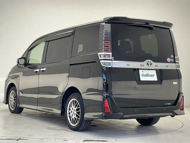 トヨタ ヴォクシー ハイブリッド ZS 煌Ⅲ 沖縄県 2021(令3)年 4.5万km イナズマスパーキングブラックガラスフレーク 純正９インチナビ(NSZT-Y68T)/(フルセグ　ＤＶＤ　Ｂｌｕｅｔｏｏｔｈ)/ビルトインＥＴＣ/前後ドライブレコーダー/ＴＳＳ　/ステアスイッチ　/両側パワースライドドア　/ハーフレザーシート /シートヒーター　/USBポート/ハーフレザー　/ウィンカーミラー　/ＬＥＤヘッドライト