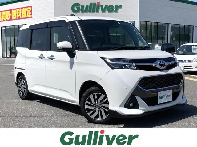 トヨタ タンク カスタムG 鳥取県 2020(令2)年 1.3万km パールホワイトⅢ 純正ナビ/フルセグ/CD/BT/パノラミックビューモニター/スマートアシスト/両側パワースライドドア/前席シートヒーター/クルーズコントロール/LEDヘットライト/オートハイビーム/純正14インチアルミホイール/プッシュエンジンスタート/アイドリングストップ/純正フロアマット/ドアバイザー/保証書・取扱説明書