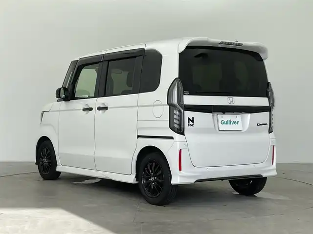 ホンダ Ｎ ＢＯＸ カスタム L スタイル+ブラック 富山県 2022(令4)年 2.1万km プラチナホワイトパール 純正8型ナビ(AM/FM/CD/DVD/BT/HDMI)/フルセグTV/バックカメラ/両側パワースライドドア/衝突被害軽減ブレーキ/レーダークルーズコントロール/レーンキープアシスト/コーナーセンサー/前席シートヒーター/純正前後ドライブレコーダー/ETC/電動パーキングブレーキ/オートブレーキホールド/LEDヘッドライト/オートライト/フォグランプ/プッシュスタート/スマートキー/スペアキー/横滑り防止装置/純正フロアマット/保証書/取扱説明書