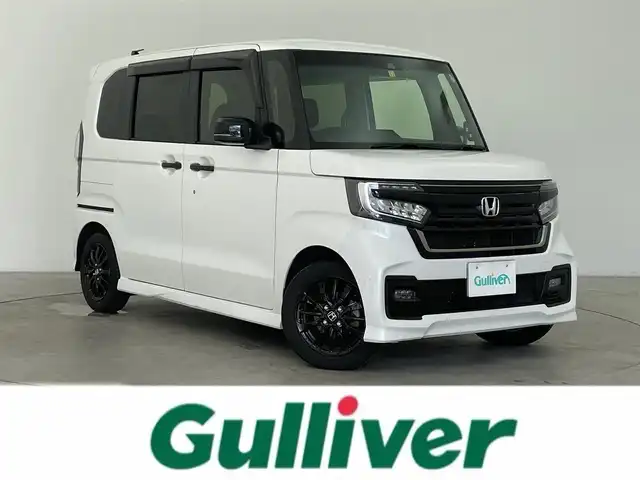 ホンダ Ｎ ＢＯＸ カスタム L スタイル+ブラック 富山県 2022(令4)年 2.1万km プラチナホワイトパール 純正8型ナビ(AM/FM/CD/DVD/BT/HDMI)/フルセグTV/バックカメラ/両側パワースライドドア/衝突被害軽減ブレーキ/レーダークルーズコントロール/レーンキープアシスト/コーナーセンサー/前席シートヒーター/純正前後ドライブレコーダー/ETC/電動パーキングブレーキ/オートブレーキホールド/LEDヘッドライト/オートライト/フォグランプ/プッシュスタート/スマートキー/スペアキー/横滑り防止装置/純正フロアマット/保証書/取扱説明書
