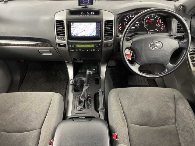 トヨタ ランドクルーザー プラド TX－LTD 道央・札幌 2007(平19)年 5.7万km ホワイトパールクリスタルシャイン ・4WD/・純正HDDナビ/・CD/DVD/SD/HDD/AUX/フルセグTV/・Bluetooth接続/・サンルーフ/ルーフレール/・バックカメラ/ETC/・センターデフロック/・純正エンジンスターター/・前方ドライブレコーダー/・オートライト/フォグランプ/・積込冬タイヤAWセット/・電動格納ミラー/ミラーヒーター/・ヘッドライトレベライザー/・リモコンキー/スペアキー/・ドアバイザー/純正フロアマット