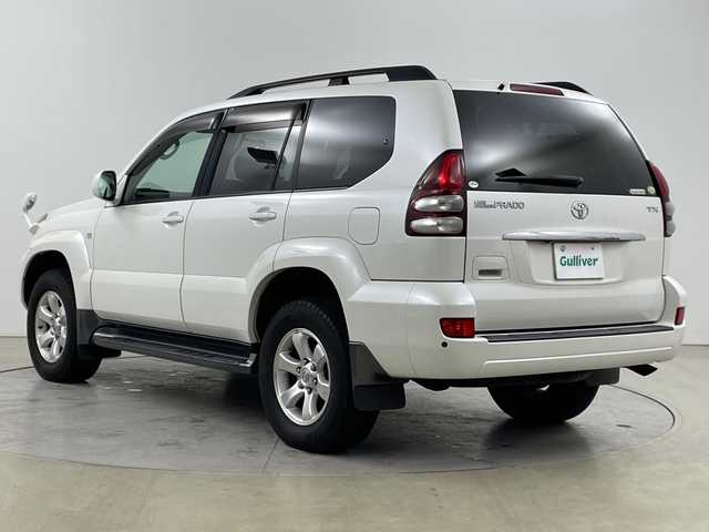 トヨタ ランドクルーザー プラド TX－LTD 道央・札幌 2007(平19)年 5.7万km ホワイトパールクリスタルシャイン ・4WD/・純正HDDナビ/・CD/DVD/SD/HDD/AUX/フルセグTV/・Bluetooth接続/・サンルーフ/ルーフレール/・バックカメラ/ETC/・センターデフロック/・純正エンジンスターター/・前方ドライブレコーダー/・オートライト/フォグランプ/・積込冬タイヤAWセット/・電動格納ミラー/ミラーヒーター/・ヘッドライトレベライザー/・リモコンキー/スペアキー/・ドアバイザー/純正フロアマット