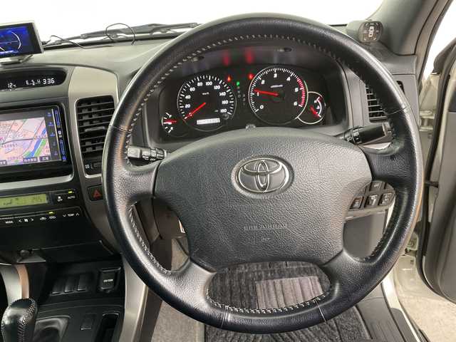 トヨタ ランドクルーザー プラド TX－LTD 道央・札幌 2007(平19)年 5.7万km ホワイトパールクリスタルシャイン ・4WD/・純正HDDナビ/・CD/DVD/SD/HDD/AUX/フルセグTV/・Bluetooth接続/・サンルーフ/ルーフレール/・バックカメラ/ETC/・センターデフロック/・純正エンジンスターター/・前方ドライブレコーダー/・オートライト/フォグランプ/・積込冬タイヤAWセット/・電動格納ミラー/ミラーヒーター/・ヘッドライトレベライザー/・リモコンキー/スペアキー/・ドアバイザー/純正フロアマット