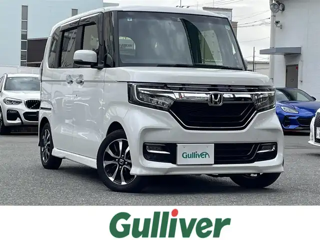 ホンダ Ｎ ＢＯＸ カスタム G L ホンダセンシング 福岡県 2019(令1)年 4.8万km プラチナホワイトパール ワンオーナー/純正ディーラーナビ/（Gathers:VXM-194VFi）/Bluetooth対応/フルセグTV/FM/AM/CD/DVD/クルーズコントロール/バックカメラ/ドライブレコーダー（前方）/片側パワースライドドア/ビルトインETC/アイドリングストップ/ドアバイザー/純正フロアマット/純正アルミホイール/プッシュスタート/保証書/取扱説明書/スペアキー/スマートキー