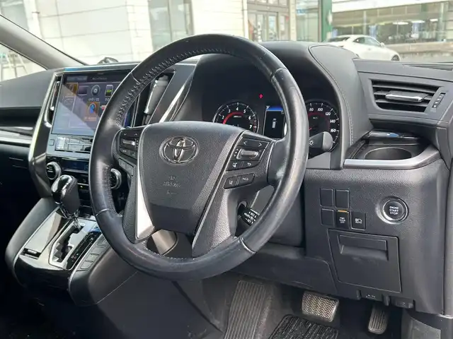 トヨタ ヴェルファイア Z Aエディション 広島県 2019(平31)年 8.6万km ホワイトパールクリスタルシャイン サンルーフ/モデリスタエアロ/アルパインナビ/　「Bluetooth/ワンセグ/CD/DVD」/デジタルインナーミラー/アルパイン後席モニター/バックカメラ/レーダークルーズコントロール/トヨタセーフティーセンス/衝突軽減ブレーキシステム/電動パーキングブレーキ/両側パワースライドドア/オートマチックハイビーム/LEDヘッドライト/ＥＴＣ/ドアバイザ-/スマートキー/プッシュスタート/保証書/取扱説明書