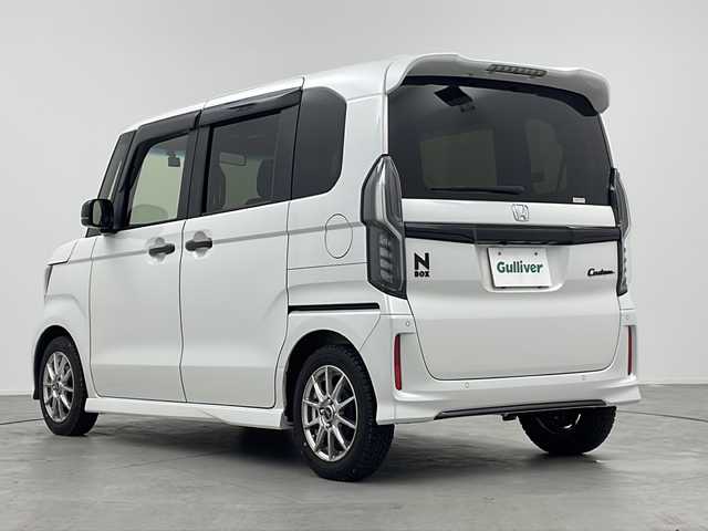 ホンダ Ｎ ＢＯＸ カスタム L スタイル+ブラック 三重県 2022(令4)年 2.1万km プラチナホワイトパール 禁煙車/ホンダセンシング/●衝突軽減ブレーキ（CMBS）/●誤発進抑制機能/●歩行者事故低減ステアリング/●路外逸脱抑制機能/●渋滞追従機能付アダプティブクルーズコントロール（ACC）/●車線維持支援システム（LKAS）/●先行車発進お知らせ機能/●標識認識機能/●後方誤発進抑制機能/●オートハイビーム/純正８型ナビ（vxu-227nbi）/・フルセグ/・CD/DVD/・SD音楽録音/・Bluetooth/・SD音楽録音/バックカメラ/革巻きステアリング/シートヒーター/LEDへっどらいと/電動パーキングブレーキ/ブレーキホールド/純正14インチアルミホイール