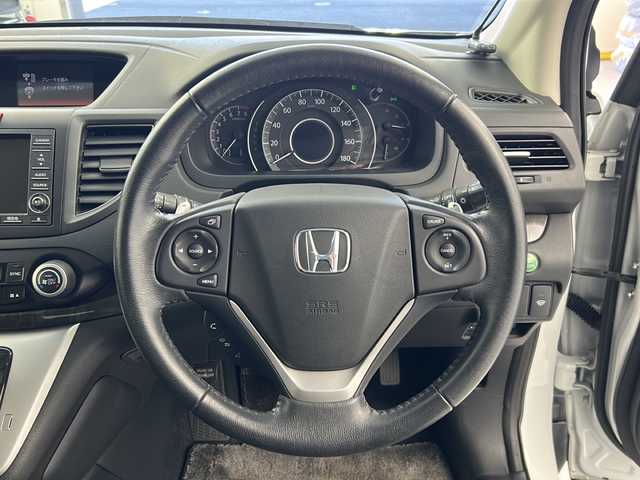 ホンダ ＣＲ－Ｖ 24G レザーパッケージ 岐阜県 2013(平25)年 7.8万km ホワイトオーキッドパール ４WD/純正HDDナビゲーション/AM/FM/CD/DVD/TV/バックカメラ/D席・N席シートヒーター/D席パワーシート/本革シート/純正17インチアルミホイール/スマートキー/スペアキー/横滑り防止装置/ドアバイザー/純正フロアマット/トノカバー/ビルトインETC/HIDヘッドライト/フォグライト/ミラーウィンカー/スペアタイヤ