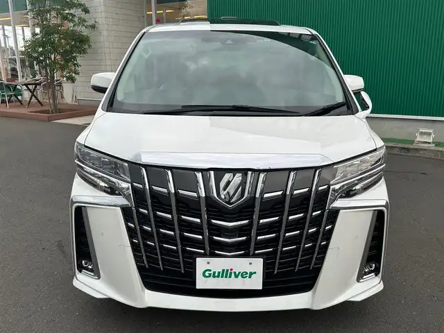 トヨタ アルファード S Cパッケージ 宮城県 2022(令4)年 1.9万km ホワイトパールクリスタルシャイン ツインムーンルーフ/デジタルインナーミラー/ブラインドスポットモニター/パーキングサポートブレーキ（後方接近車両）/スペアタイヤ/＝＝＝/セーフティセンス/・プリクラッシュセーフティ/・レーントレーシングアシスト/・ロードサインアシスト/・アダプティブハイビームシステム/・レーダークルーズコントロール（全車速追従機能付）/パーキングサポートブレーキ（前後方静止物）/純正12インチフリップダウンモニター/9インチディスプレイオーディオ/・ナビ機能付/・CD/DVDデッキ/・Bluetooth/バックカメラ/ビルトインETC/AC100V/100Wコンセント/パワーバックドア/両側パワースライドドア/合皮シート/シートヒーター/ベンチレーション/パワーシート（運転席メモリー機能付）/ウッドコンビステアリング/ステアリングヒーター/電動パーキングブレーキ/ブレーキホールド/3眼LEDヘッドランプ/スマートキー＆プッシュスタート/純正18インチAW/フロアマット/W/サイド/カーテンエアバッグ